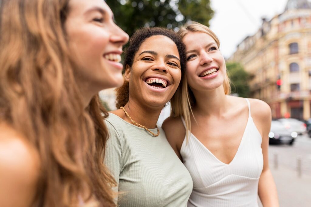 beautiful-female-friends-smiling-being-happy